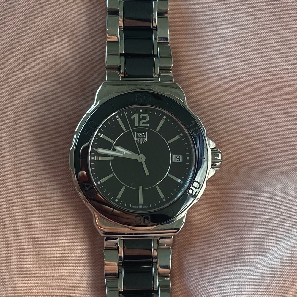 TAG Heuer Elegant Black and Silver women’s watch.